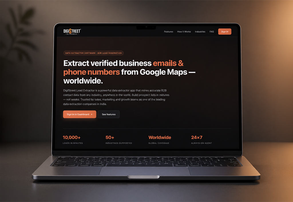 Laptop displaying a dark marketing webpage about extracting business emails and phone numbers from Google Maps worldwide (Digistreet).