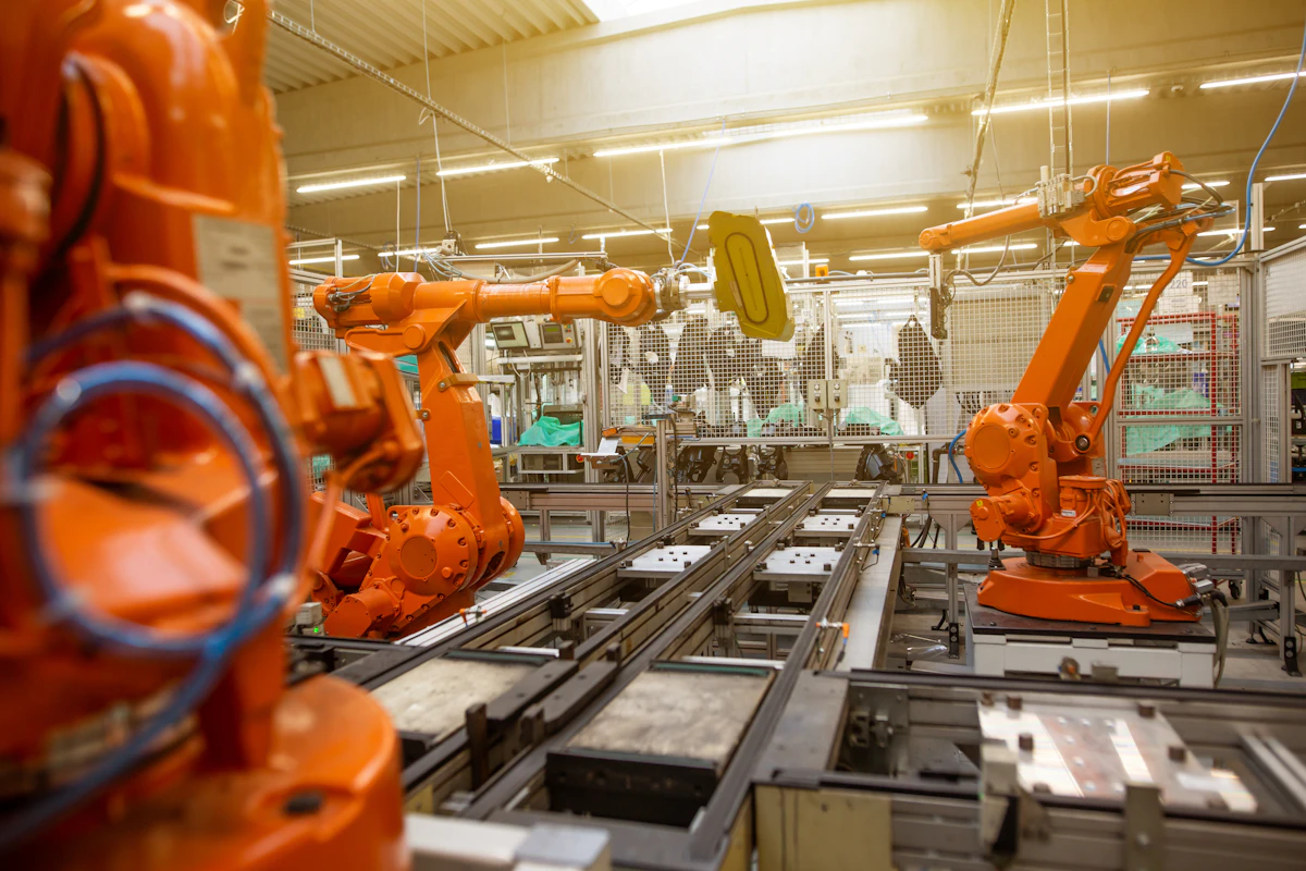 Robotic arms on an industrial manufacturing line, B2B and industrial marketing