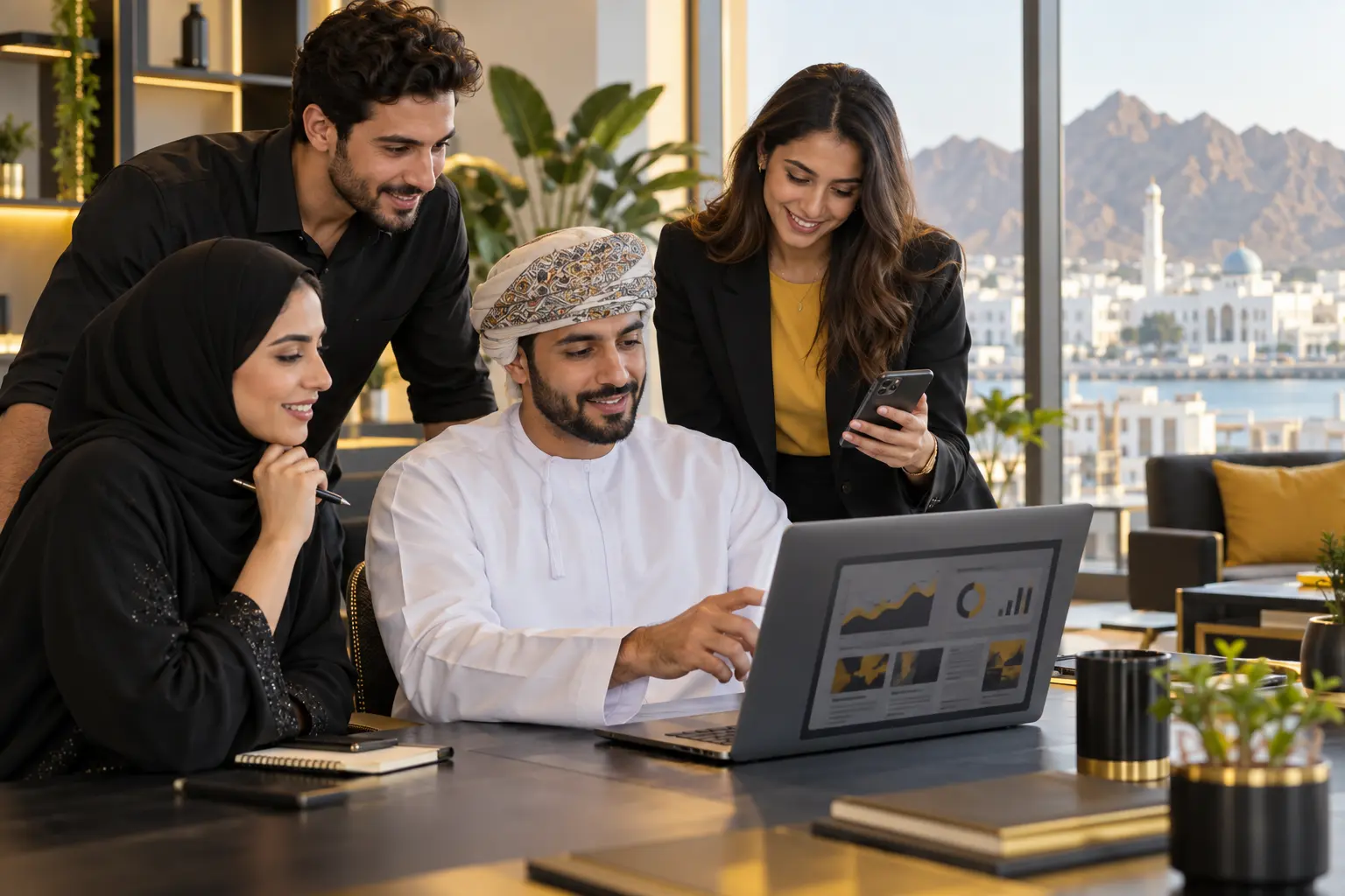 Marketing team reviewing paid and social media campaigns for the Oman market